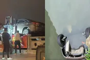 【影】94狂！車位被占對方拒移車　男子霸氣找來推高機直接把車扔河中