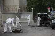 影/不忍了！海地人民「私刑」黑幫分子洩恨　邊焚屍邊暴打遺體…百人街頭圍觀