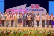 助人最樂！移民署志工隊成立20年　首獲全國績優團體獎