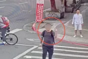 影/北市無聊男闖紅燈跳舞囂張比中指　警：已違規、觸法