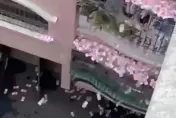 影/陽台街道一片紅通通！與家人爭執他怒撒大量鈔票　無人敢撿鄰急報警