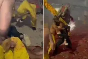 影/母湯！男抱小孩衝進舞龍隊扯龍鬚　「褻瀆民俗」慘遭護龍壯漢圍毆