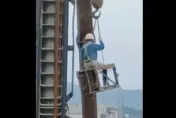 影/無視人命！汐止社宅工程坐吊車掛半空　工人「無繫繩作業」險墜落地