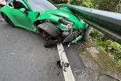 影/拓海差點填海！北宜700萬保時捷過彎「開上山壁」　卡護欄車輪變形