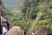 影/奪命打卡！37歲陸女崖邊拍照墜亡　兩兒目睹全程