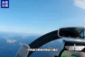 影/陸雙航母罕現西太！央視釋「殲-15」帶彈起飛驅離外機