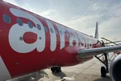 亞航鬧笑話！機長喊「抵達仁川機場」　乘客望窗外傻了