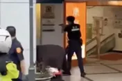 影/北市忠孝東路驚傳銀行搶案　歹徒挾持行員遭警方制伏