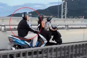 淡江大橋機車騎士龜速看風景引衝突　警方依法開罰