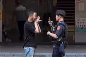 影/北市男毒酒駕車停路中下車吐　警攔查比YA嗆「壓制我」