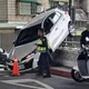 北市南港轎車倒車暴衝　卡橋上欄杆險墜大排
