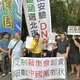 影/直擊！725 「我是人我反毒台」　台灣國鬧場警舉牌警告