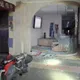 影/三重重機車擦撞賓士噴飛　撞爛牙醫診所店面玻璃
