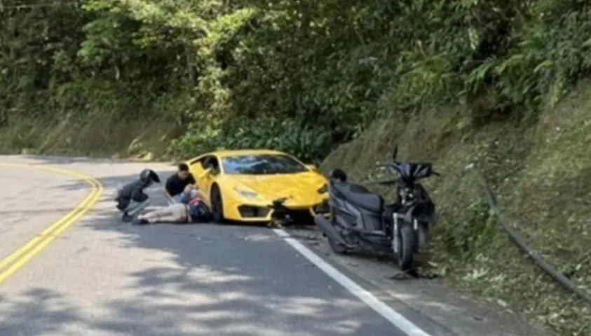 快訊/北宜公路藍寶堅尼擊落機車　騎士倒地受傷送醫