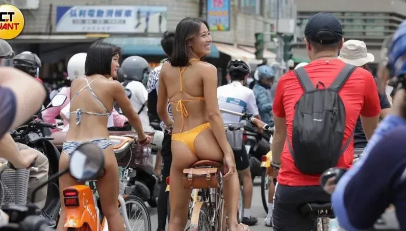 百位帥哥美女衝高雄！火辣比基尼妹騎單車遊行　好身材曬給你看