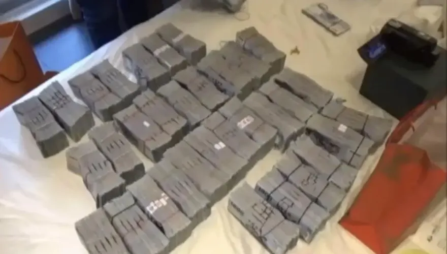 影/刑事局破假投資詐騙集團　主嫌家中床頭櫃搜出2千萬現金