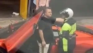 影/開超跑不用繫安全帶？板橋麥拉倫男被警攔竟下車嗆聲　當場吞萬元紅單
