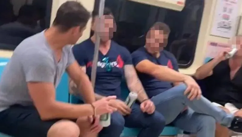 影/澳洲消防猛男北捷車廂爽喝啤酒　2度道歉秀證明「已繳罰款」