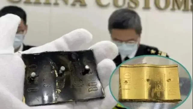 影/又見奇葩走私！女子入境深圳　腰間皮帶扣「黑漆刮掉驚見黃金」