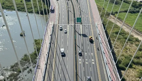 新北大橋機車彎道改善工程完成！打造以人為本降低通勤風險