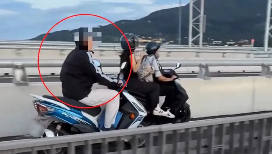淡江大橋機車騎士龜速看風景引衝突　警方依法開罰