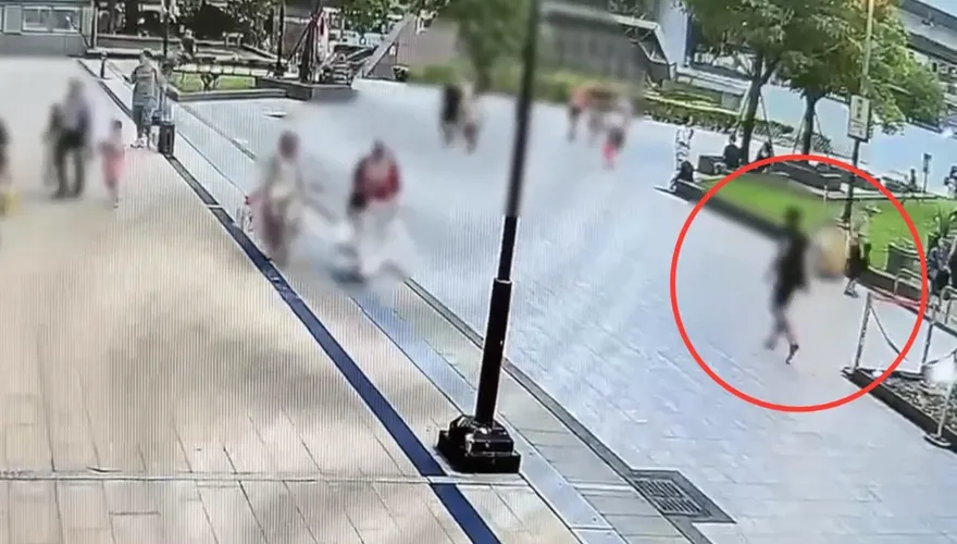 影/台北車站門口男子發狂丟石頭　遭管束強制送醫