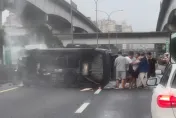 影/颱風天失控？國道1號康寧交流道「休旅車翻覆」　民眾抬出受困男子