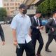 王大陸閃兵案外案二度出庭　著襯衫鴨舌帽現身新北地院
