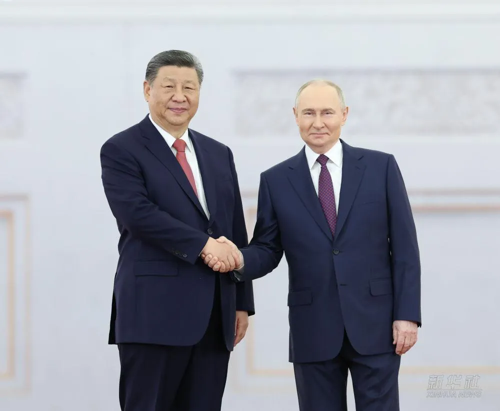 習近平（左）、普丁。（資料照／新華社）