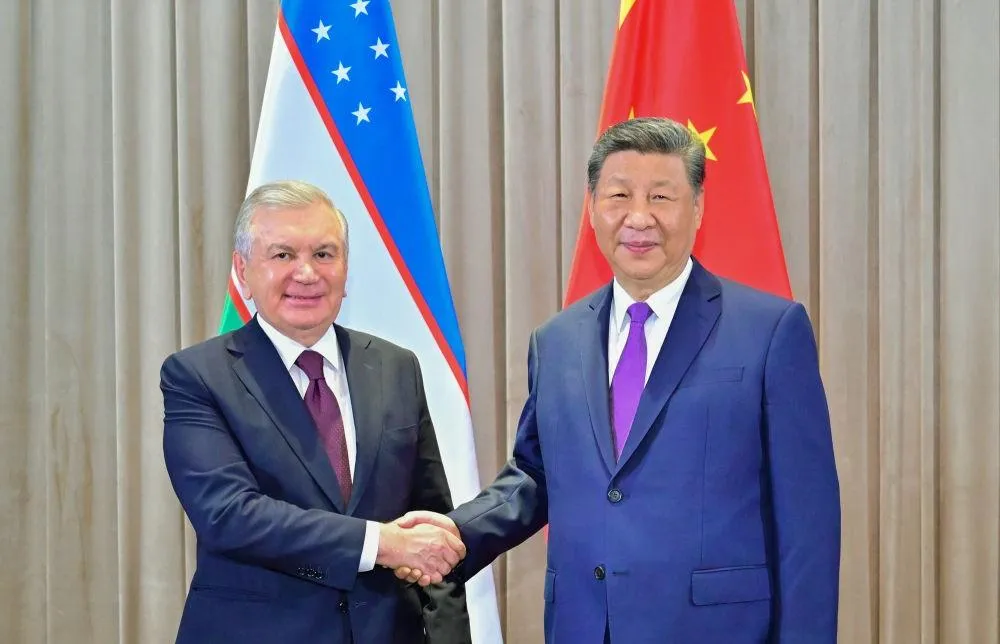 習近平會見烏茲別克斯坦總統米爾濟約耶夫。（圖/新華社）