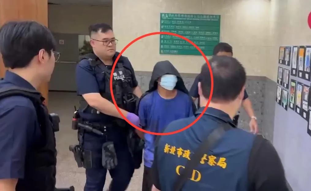 嫌犯開槍打傷水產行員工遭當場逮捕。（圖／翻攝畫面）