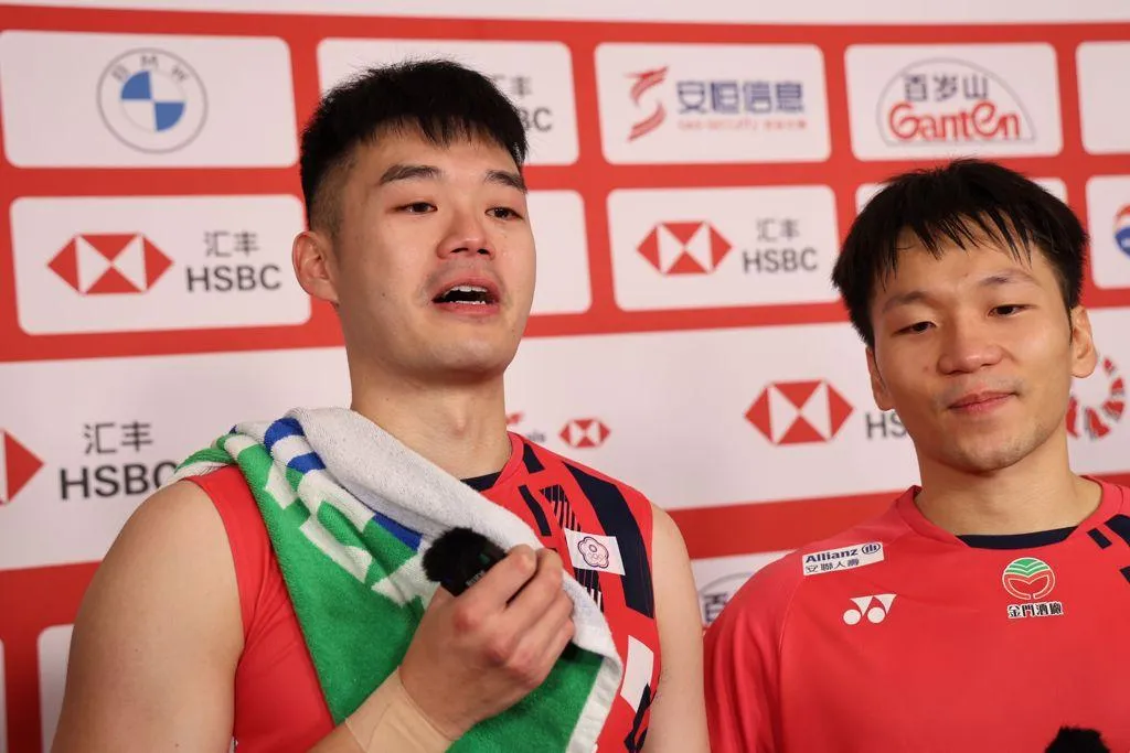 李洋(圖右)、王齊麟。(圖/羽球協會提供)