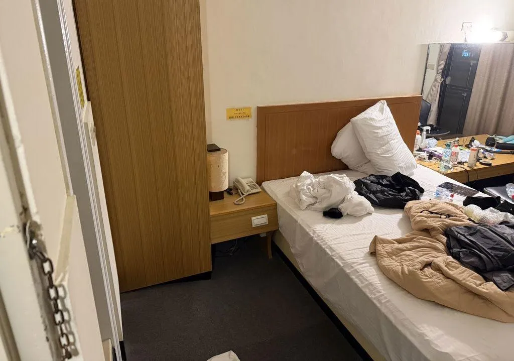 張文犯案前2天入住北市大同區南京西路一間旅館。(圖/警方提供)