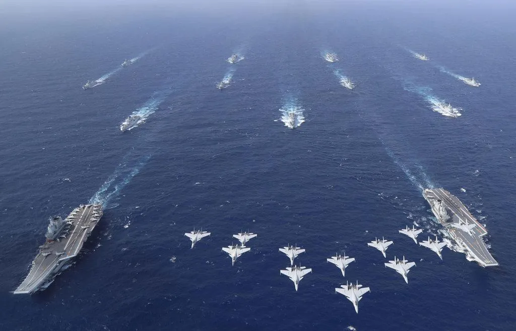 解放軍機近日擾台架次驟減，學者林穎佑分析，原因應是與正在舉行的「兩會」有關。（圖/新華社）