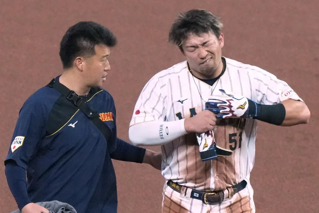 鈴木誠也滑壘受傷。（圖／美聯社）