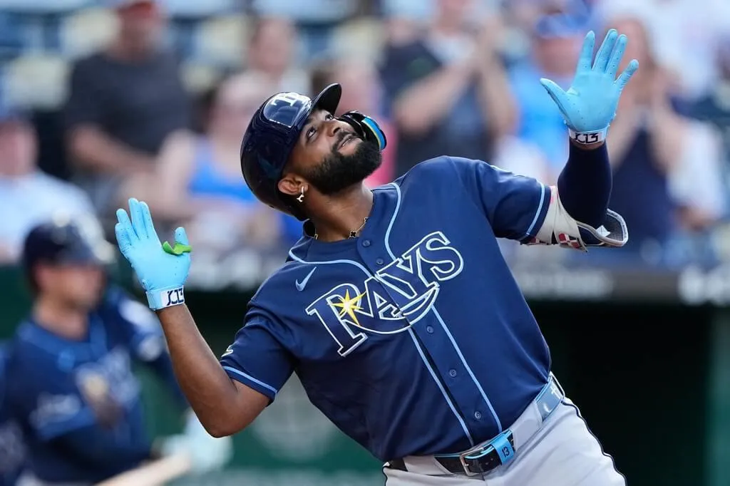 MLB坦帕灣光芒重砲卡米內羅6月30日擊出3分全壘打後開心慶祝。（圖／美聯社）