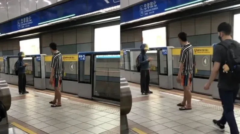男子不斷用身體擋人、辱罵不雅字眼,並試圖點燃打火機。(圖/翻攝自Threads)