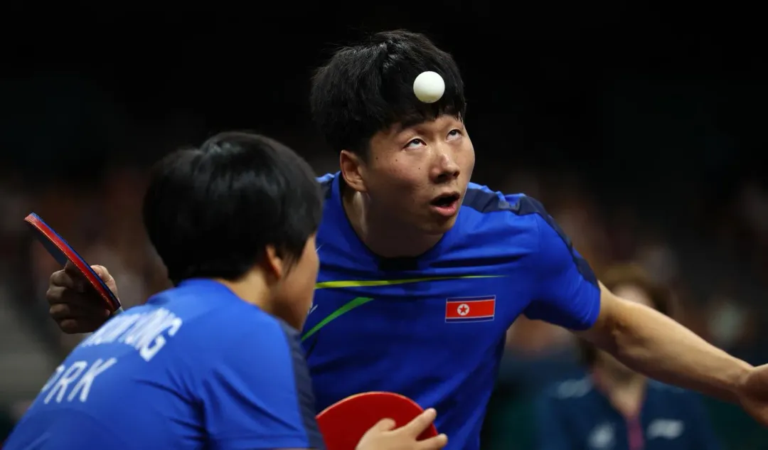 北韓桌球混雙李鄭息、金琴英以4比3打敗香港組合闖進決賽(圖/路透)