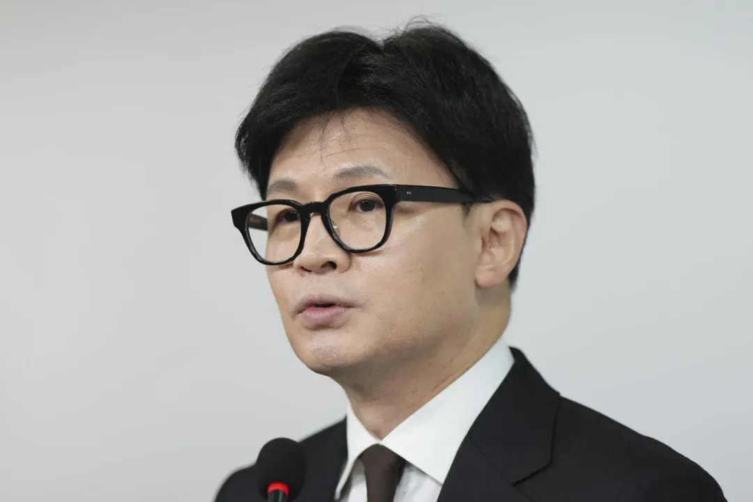 南韓國民力量黨黨魁韓東動宣在辭職。(圖/美聯社)
