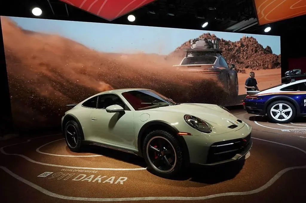 保時捷(Porsche)傳將在大陸地區裁員幅度達三成人力(圖/AP)