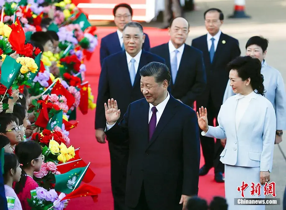 2019年大陸國家主席習近平攜夫人彭麗媛赴澳門。(圖/翻攝中新網)