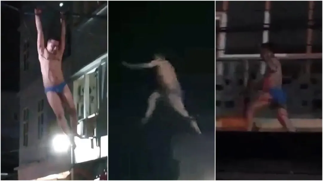 內褲男如泰山上身，跳上電線並垂吊攀爬。（圖／翻攝IG）