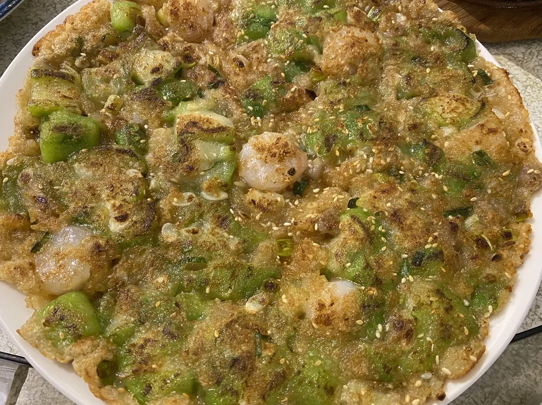 絲瓜蝦仁煎化用台灣有名的蚵仔煎，入口嘗出店家秘方的特別口味。（圖／黃宏輝提供）