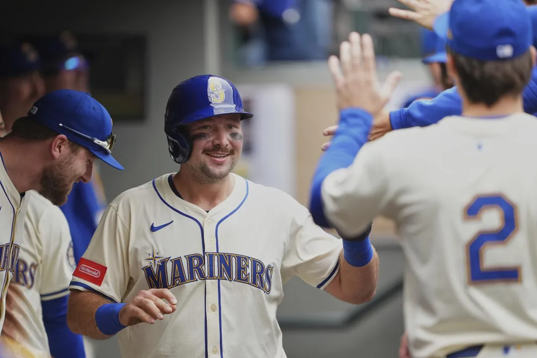 勞雷開心與隊友擊掌。（圖／美聯社）