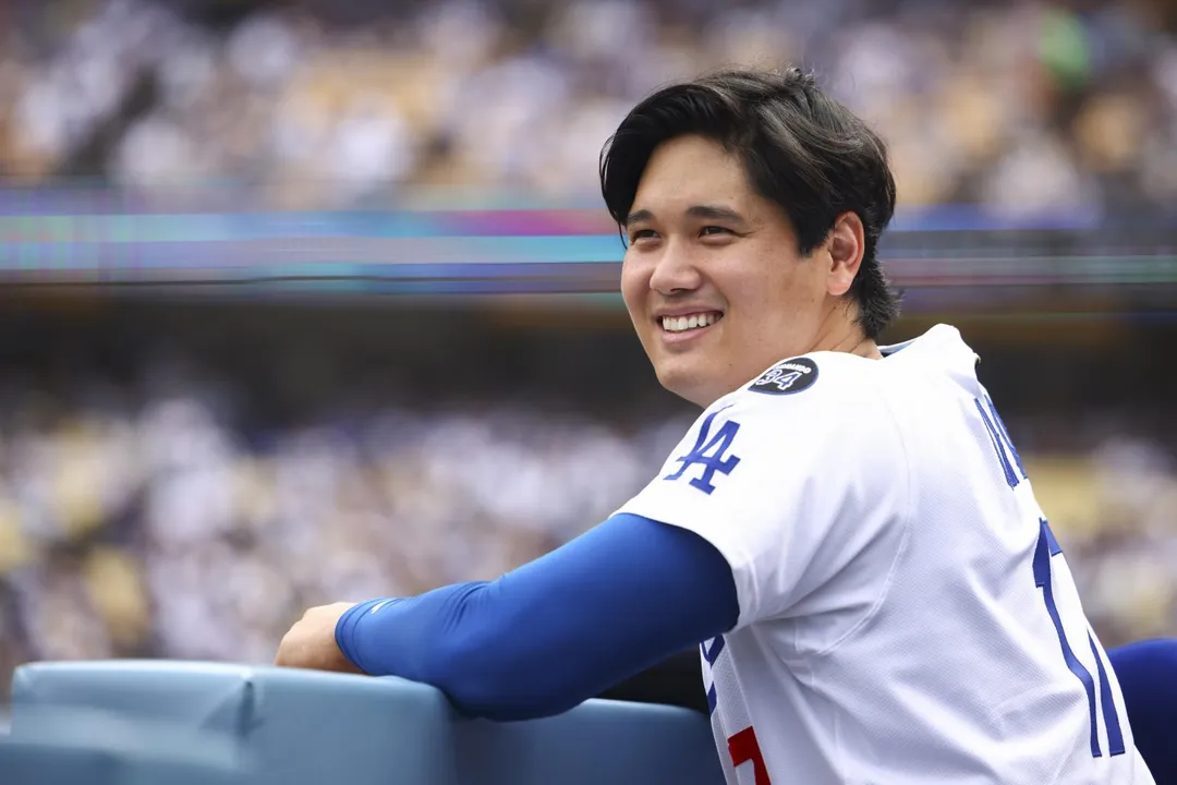 女大生賣掉大谷的300轟紀念球後，承諾與弟弟均分。（圖／美聯社）