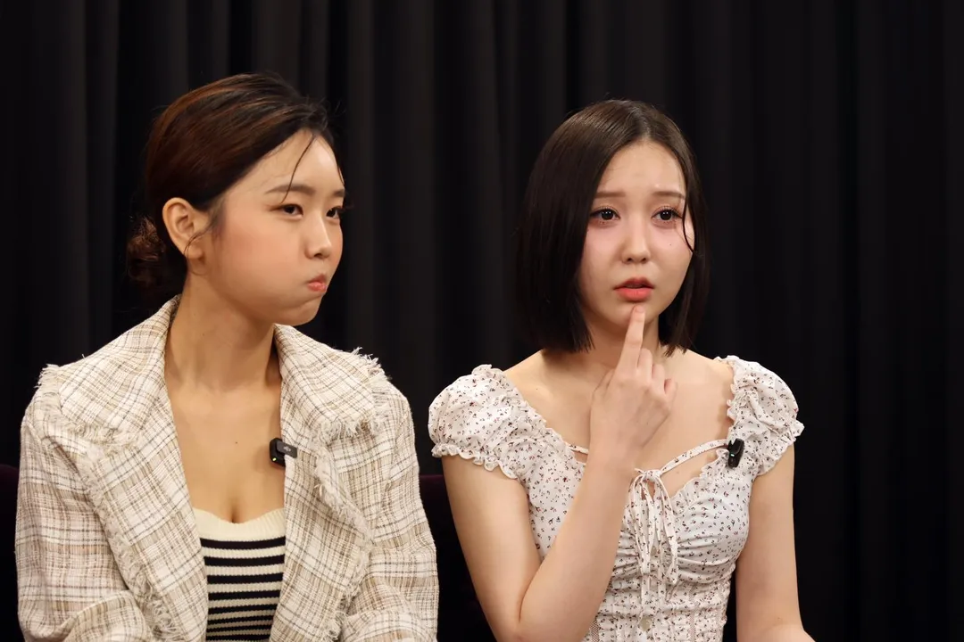 韓國女生Judy與金世星秀出「Tokki Cutie」招牌應援動作。（圖／譚兆青攝）