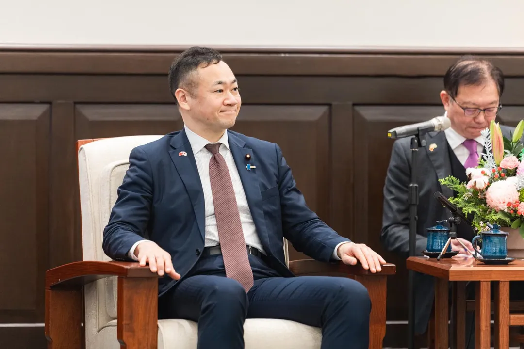 日本前法務大臣鈴木馨祐。(圖/總統府)
