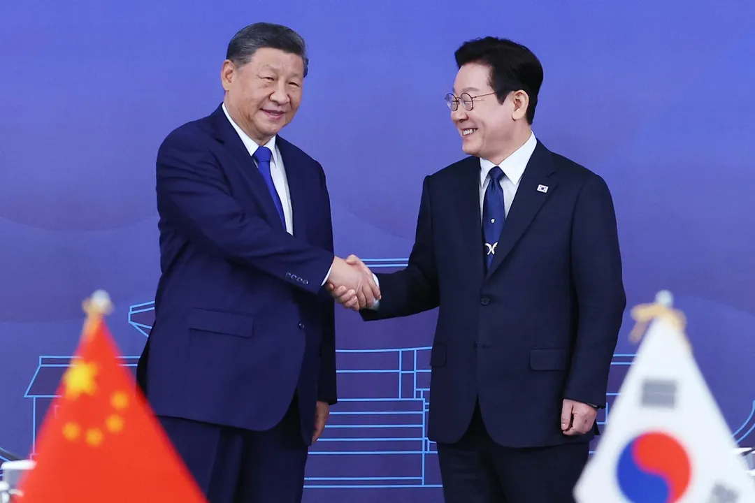 李在明(圖右)與習近平。(資料照/美聯社)