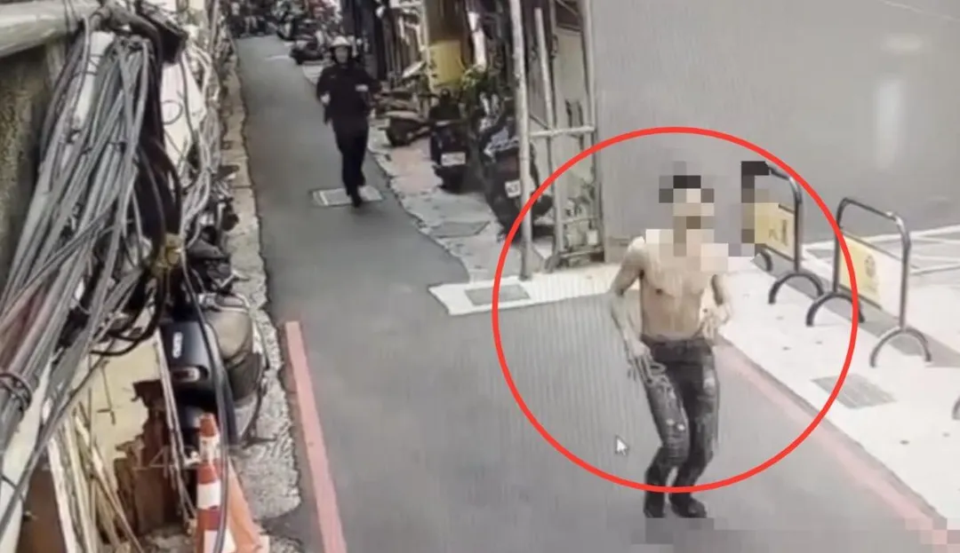 通緝男拒捕拔腿狂奔。（圖／翻攝畫面）
