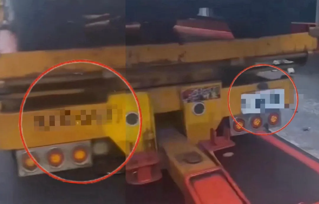 該輛拖吊車的車身上噴塗的牌照號碼(左)跟實際的牌照號碼(右)不同。(圖/社會事新聞影音)
